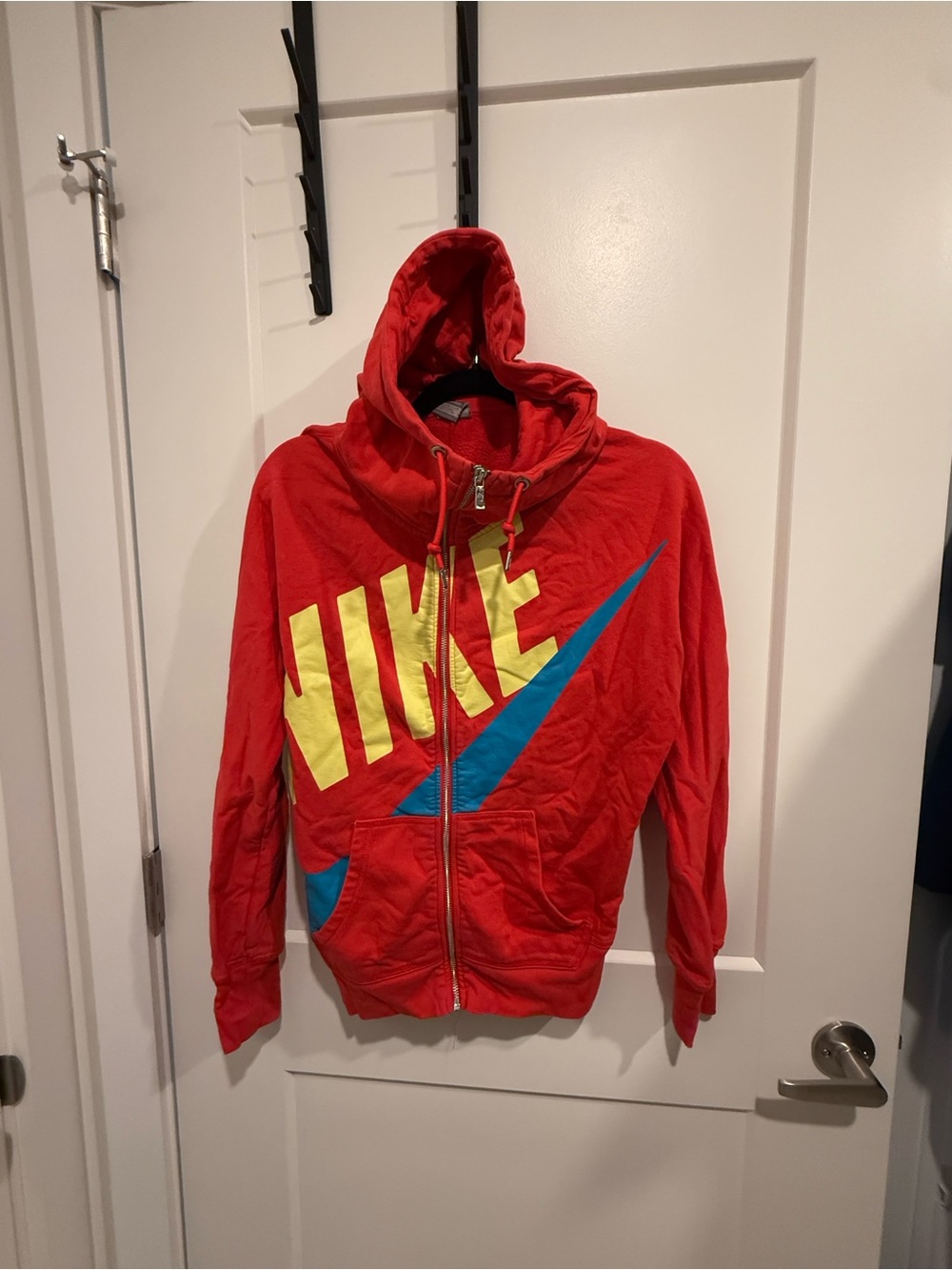 Nike Red Hoodie with Yellow NIKE and Blue Swoosh